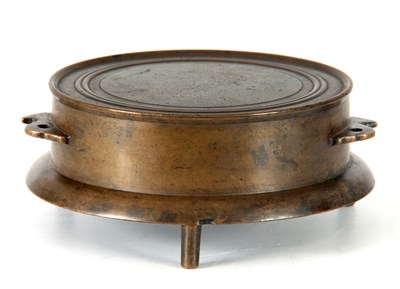 Lot 173 - AN EARLY CHINESE BRONZE STAND with ringed top...