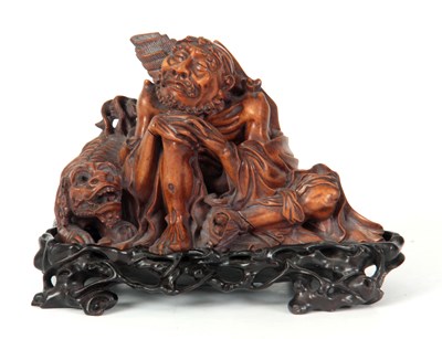 Lot 179 - A FINELY CARVED WOOD CHINESE SEATED FIGURE OF...