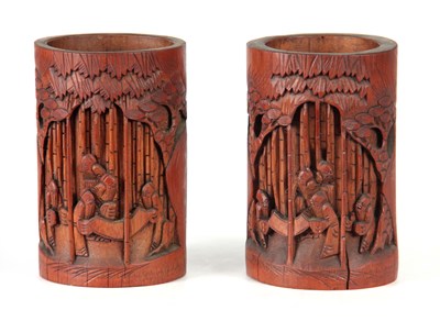 Lot 180 - A PAIR OF JAPANESE CARVED BAMBOO BRUSH POTS...