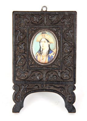 Lot 220 - A 19TH CENTURY PERSIAN MINIATURE ON IVORY...