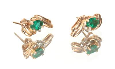 Lot 225 - A PAIR OF LADIES 14CT GOLD EMERALD AND DIAMOND...