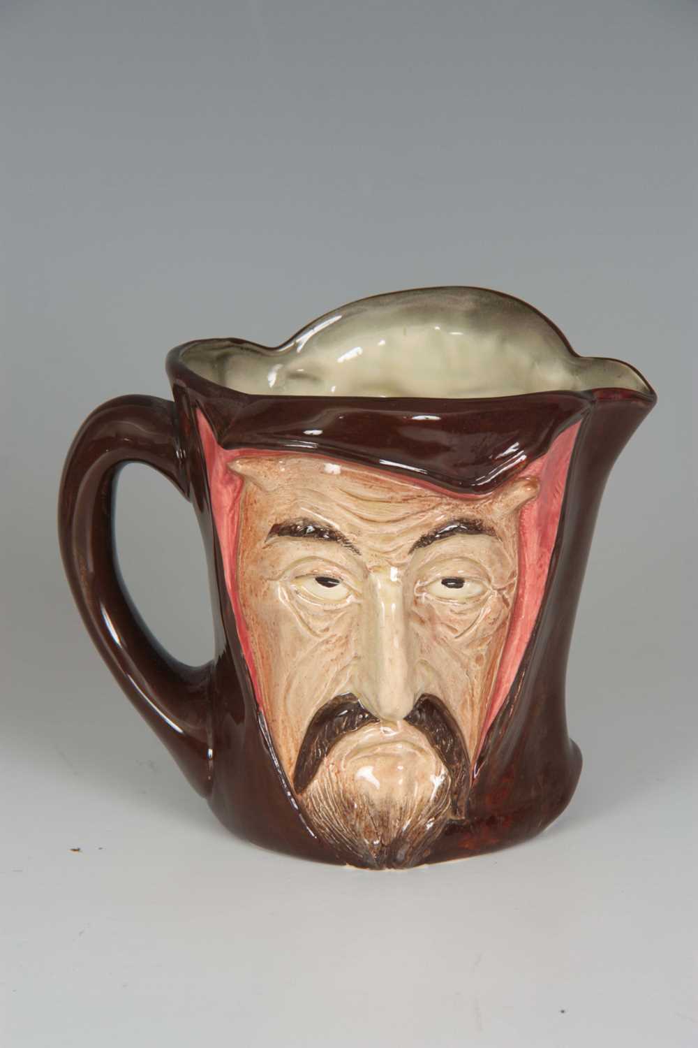 Lot 174 - A RARE ROYAL DOULTON CHARACTER JUG