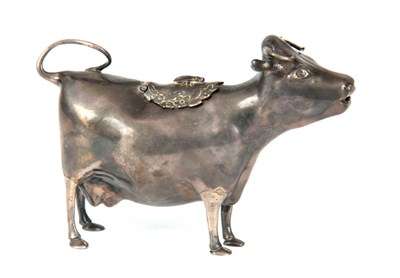 Lot 261 - AN ELIZABETH II SILVER COW CREAMER in the...