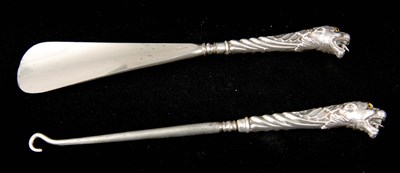 Lot 265 - A CASED SILVER HANDLED BUTTON HOOK AND SHOE...