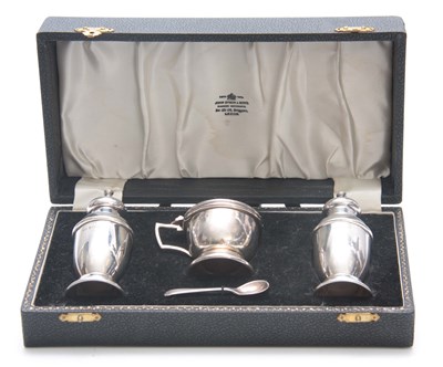 Lot 268 - A CASED SILVER CONDIMENT SET with original...