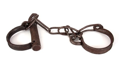 Lot 322 - A 19TH CENTURY SET OF ANKLE CUFFS / SHACKLES...