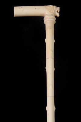 Lot 346 - A 19TH CENTURY CARVED IVORY WALKING CANE the...