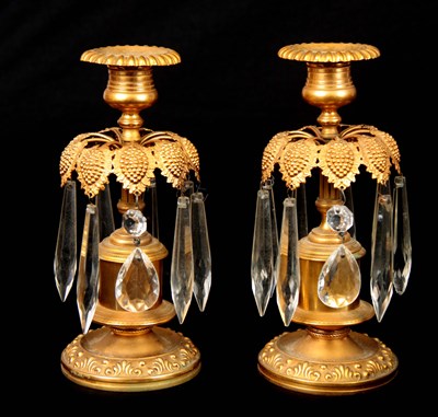 Lot 398 - A PAIR OF REGENCY GILT BRASS CANDLESTICKS WITH...