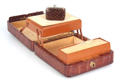 Lot 447 - A VINTAGE CROCODILE SKIN LADIES JEWELLERY CASE...