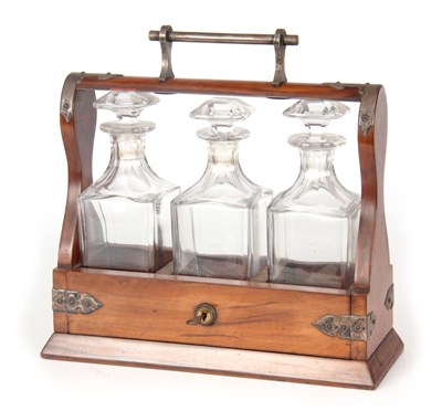 Lot 476 - A 19TH CENTURY WALNUT THREE BOTTLE SPIRIT...