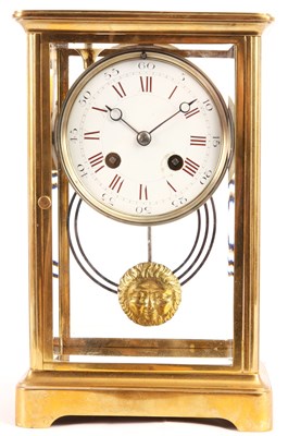 Lot 716 - A 19TH CENTURY FRENCH FOUR GLASS BRASS MANTEL...