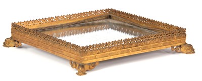 Lot 510 - A REGENCY ORMOLU TABLE TOP STAND with mirrored...