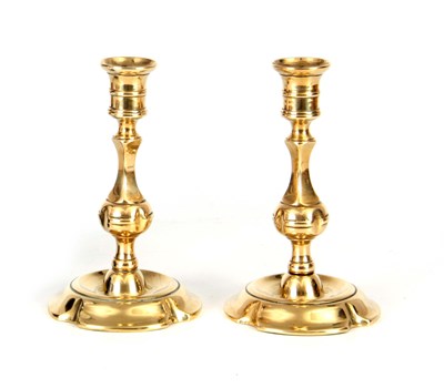 Lot 555 - AN UNUSUAL PAIR OF MID 18TH CENTURY BRASS...