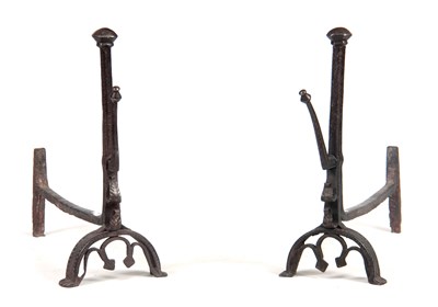 Lot 565 - A LARGE PAIR OF EARLY CAST IRON FIRE DOGS with...