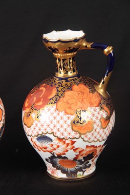 Lot 58 - A PAIR OF ROYAL CROWN DERBY BULBOUS EWERS the...