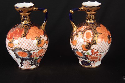 Lot 58 - A PAIR OF ROYAL CROWN DERBY BULBOUS EWERS the...