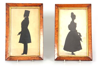 Lot 581 - A PAIR OF 19TH CENTURY SILHOUETTES depicting a...