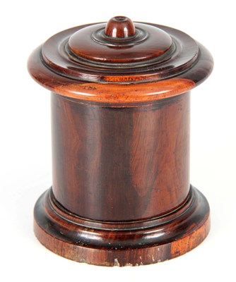 Lot 657 - A 19TH CENTURY LIGNUM VITAE CYLINDRICAL STRING...