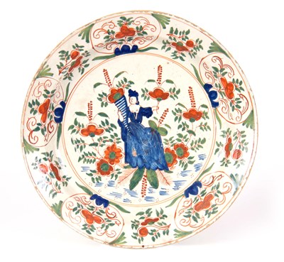 Lot 69 - AN EARLY 18TH CENTURY POLYCHROME DELFT CHARGER...