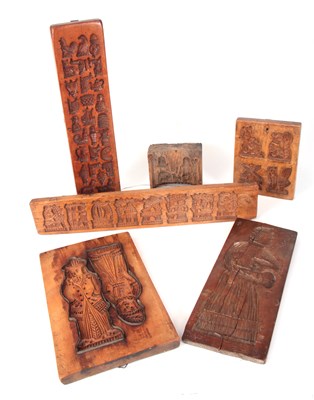 Lot 711 - AN EALRY 19TH CENTURY WALNUT GINGERBREAD MOULD...