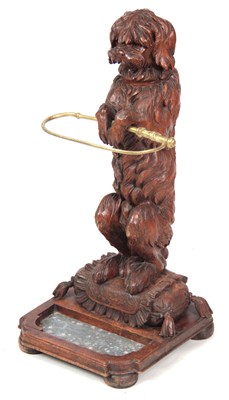 Lot 725 - A STYLISH 19TH CENTURY BLACK FOREST CARVED DOG...