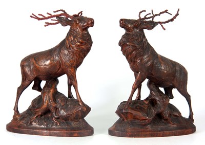 Lot 727 - A PAIR OF 19TH CENTURY CARVED LINDEN WOOD...