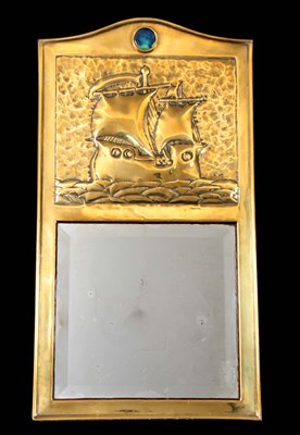 Lot 734 - AN ARTS AND CRAFTS BRASS HANGING MIRROR the...