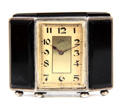 Lot 745 - AN ART DECO SWISS SILVER AND BLACK ONYX...