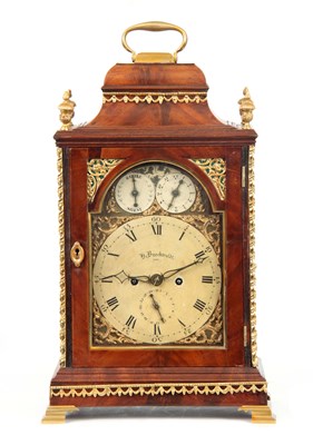 Lot 792 - A GEORGE III FIGURED MAHOGANY AND ORMOLU...