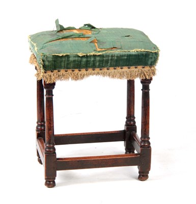 Lot 898 - A 17TH CENTURY UPHOLSTERED WALNUT JOINT STOOL...