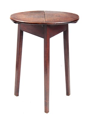 Lot 924 - A GEORGE III OAK CRICKET TABLE with an oval...