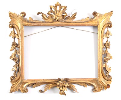 Lot 931 - AN GEORGE III CARVED GILTWOOD FRAME with...