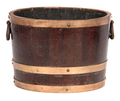 Lot 940 - A 19TH CENTURY OAK COOPERED LOG BIN OF...