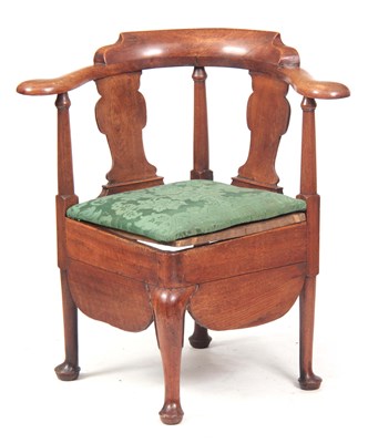 Lot 978 - A GEORGE I WALNUT CORNER COMMODE CHAIR with...