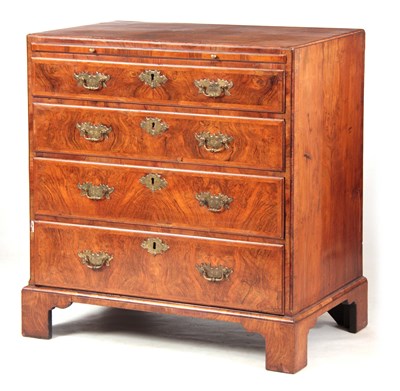 Lot 979 - A GEORGE I FIGURED WALNUT BACHELOR'S CHEST...