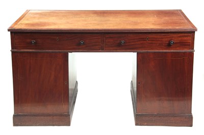 Lot 994 - A GEORGE III MAHOGANY DESK with tooled leather...