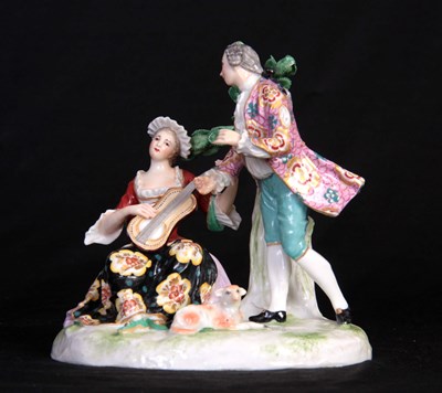 Lot 83 - A CONTINENTAL DRESDEN STYLE FIGURE GROUP...