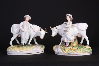 Lot 113 - A PAIR OF 19TH CENTURY STAFFORDSHIRE COW AND...