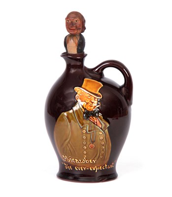 Lot 140 - A ROYAL DOULTON 'MICAWBER' TREACLE GLAZED...