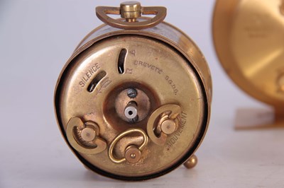 Lot 405 - A COLLECTION OF FIVE BRASS TRAVELLING CLOCKS...