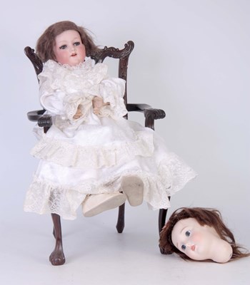 Lot 232 - AN ARMAND MARSEILLE BISQUE DOLLS HEAD with...