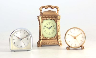 Lot 408 - A COLLECTION OF THREE CASED TRAVELLING CLOCKS...