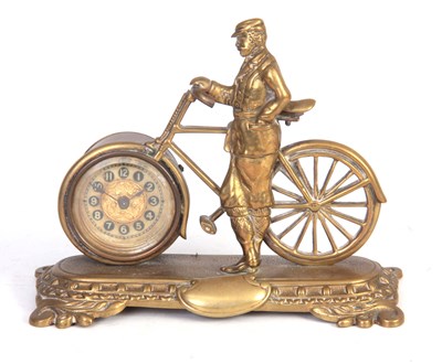 Lot 412 - AN EARLY 20TH CENTURY BRASS NOVELTY MANTEL...