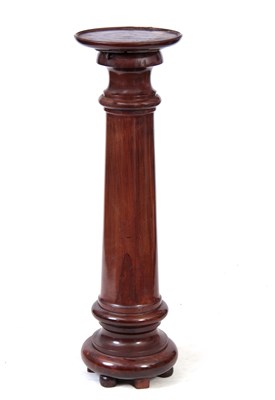 Lot 520 - A 19TH CENTURY MAHOGANY TURNED PEDESTAL with...