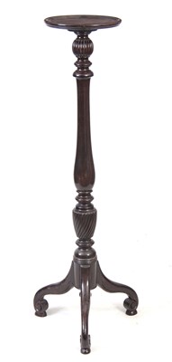 Lot 521 - A 20TH CENTURY STAINED BEECH TORCHERE with...