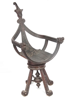 Lot 559 - AN UNUSUAL 19TH CENTURY CARVED OAK REVOLVING...