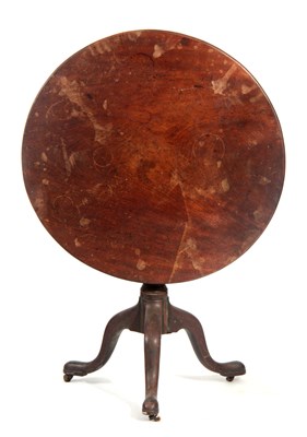 Lot 560 - AN EARLY GEORGE III MAHOGANY TILT-TOP SUPPER...