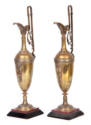 Lot 252 - A PAIR OF LATE 19TH CENTURY BRONZE EWERS ON...