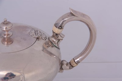 Lot 176 - A VICTORIAN SMALL SILVER TEAPOT of plain...