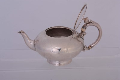 Lot 176 - A VICTORIAN SMALL SILVER TEAPOT of plain...